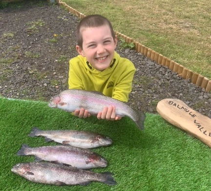 My grandson Conner with his catch see text