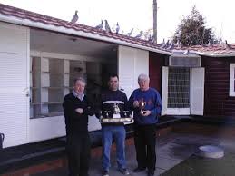 Willie Barry Kinnear with Dewar Trophy and Joe Murphy holding SNFC Gold Cup