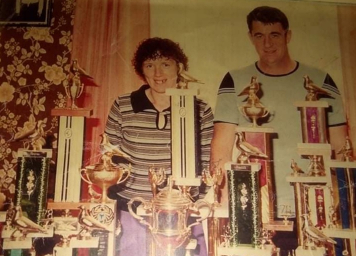 John Kenny and his wife Breda behind what must be said a spectacular display of trophies