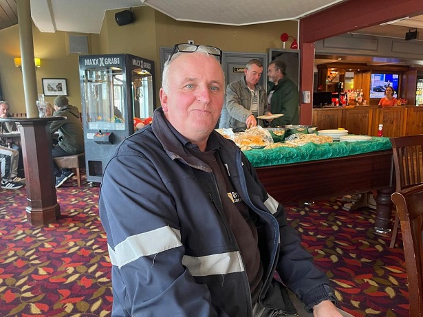 Alan Bettney with the hot and cold Buffet behind him. 04 02 22