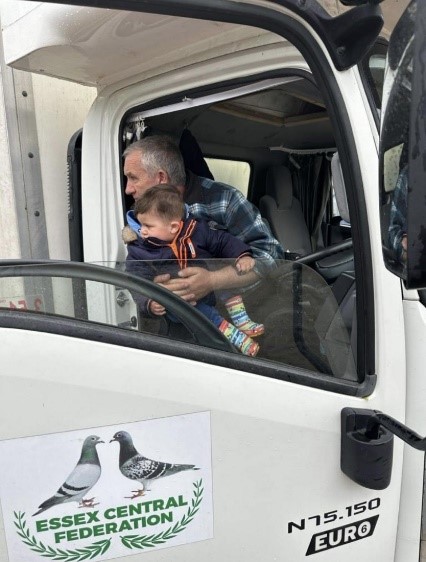 Conveyer Lee Fuller and Grandson Thomas survey the loadjpg