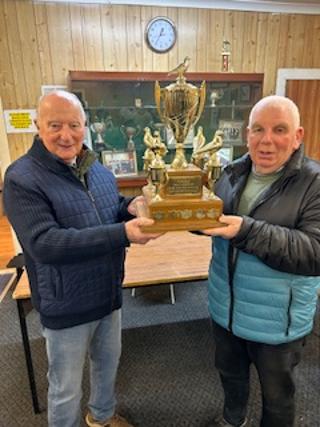 Harry Brown winner of BIS Dalziel club being presented by Specials judge Tom Corrie snr 03 01 25a