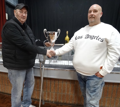 Garry Fletcher left presenting Mick Willis with the Champion of Champions trophy. 03 01 26b