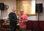 Dave Glen receiving trophy from Jack Brown